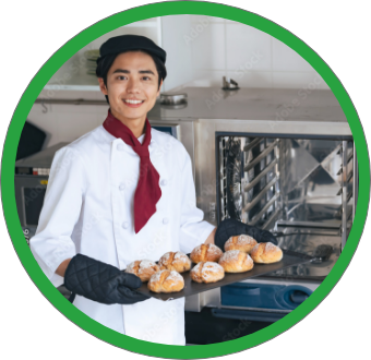 パンを焼いている店員